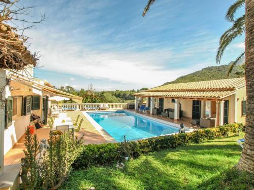 an image of a villa with a swimming pool at Belvilla by OYO Casa Aim Eri in Alcudia