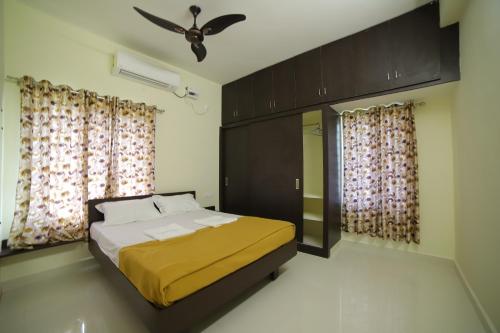Кровать или кровати в номере Taj homes stay
