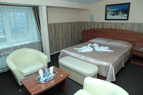 Кровать или кровати в номере Отель Прага