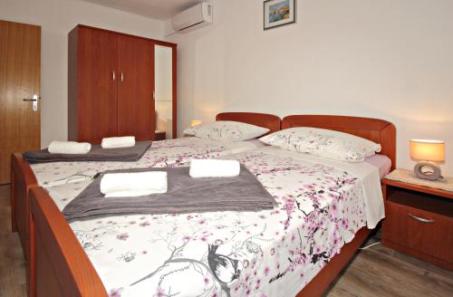 Postel nebo postele na pokoji v ubytování Apartment Milenka