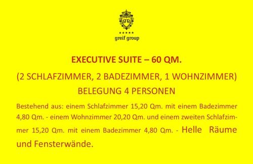 a yellow sign that says expenditure suit istg istg at Hotel Greif in Lignano Sabbiadoro
