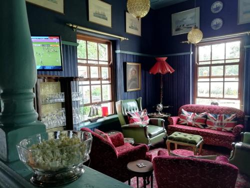 Ein Sitzbereich in der Unterkunft Oak View Manor