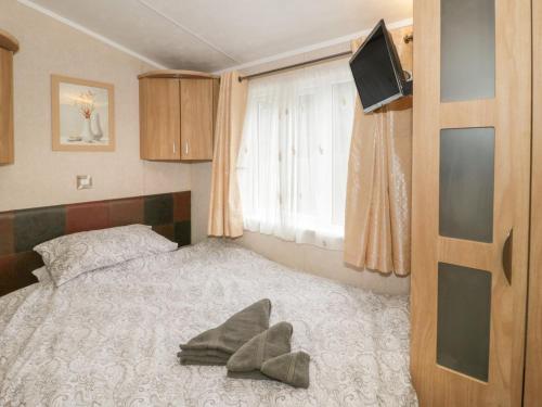 Ένα ή περισσότερα κρεβάτια σε δωμάτιο στο Banadlen Lodge