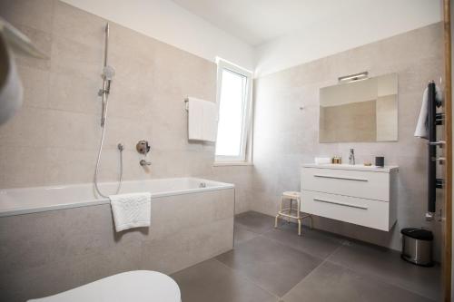 Kylpyhuone majoituspaikassa Villa Soderini