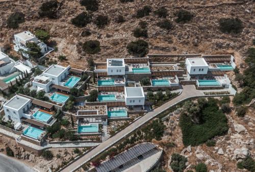 an aerial view of a villa in a resort at Hide Out Suites in Mylopotas