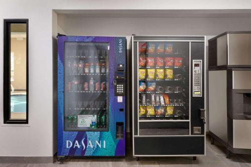 a vending machine with soda and drinks in it at Hometown Place in Olive Branch