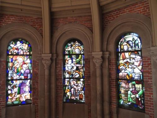 a group of stained glass windows in a church at SintAnna B&B PetitHotel in Yerseke