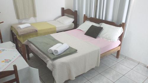 Кровать или кровати в номере Apartamento Begônia