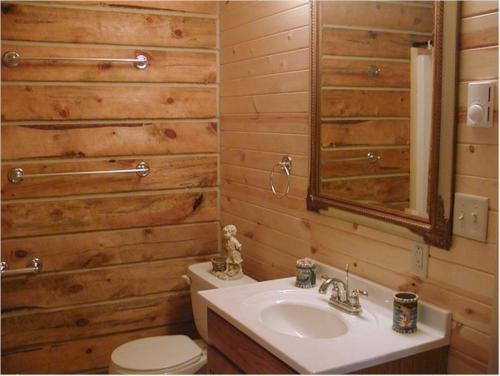 a bathroom with a sink and a toilet and a mirror at Desperado in Custer