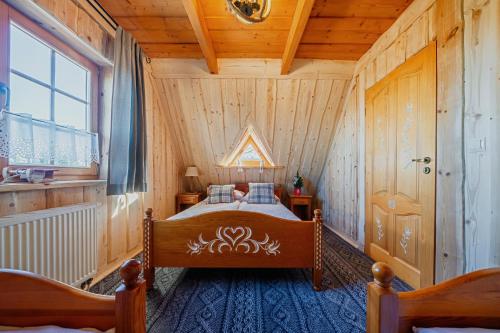 Letto o letti in una camera di Willa Pod Niebem