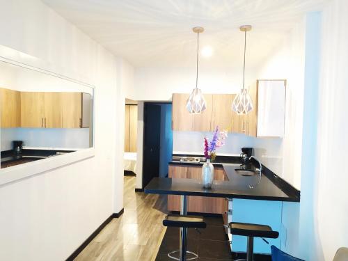 Una cocina o zona de cocina en 7 Apartamento dos habitaciones Cedritos Minimalista