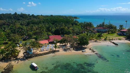 an aerial view of a resort on a beach at Hospedaje Yarisnori in Bocas del Toro