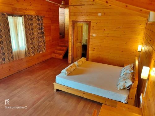 Cama o camas de una habitación en labdhi Resorts Masinagudi- Stag Groups not allowed