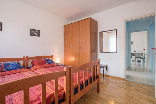Posteľ alebo postele v izbe v ubytovaní Apartment Pavlovic