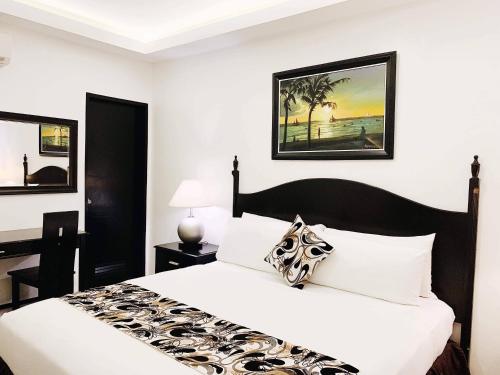 Postel nebo postele na pokoji v ubytování Chateau De Boracay
