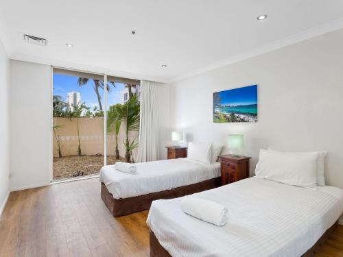 Postel nebo postele na pokoji v ubytování Spacious 3 Bedroom Family Apartment