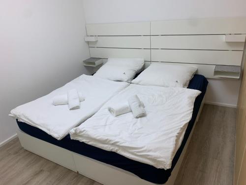 Postelja oz. postelje v sobi nastanitve Gehobenes Apartment in ruhiger Wohngegend Münchens