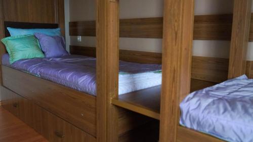 a couple of bunk beds in a room at City Hostel Panorama in Uzhhorod