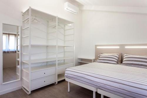 A bed or beds in a room at Bed & Bike