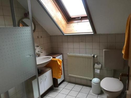 Ванная комната в Ferienwohnung Wiggermann