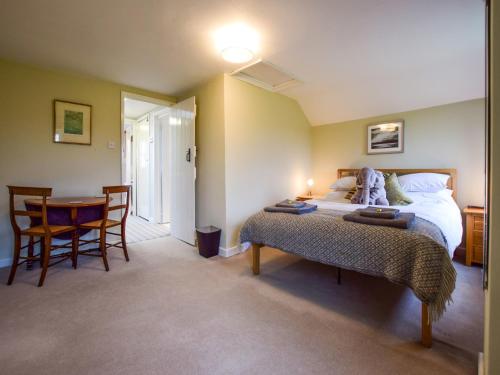 Postel nebo postele na pokoji v ubytování Granary, Cheltenham