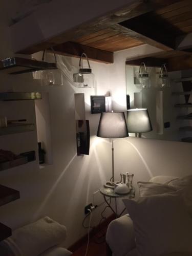 Ένα ή περισσότερα κρεβάτια σε δωμάτιο στο Little Prive Near Lake Maggiore