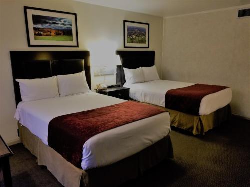 Cama o camas de una habitación en Ramada by Wyndham Washington