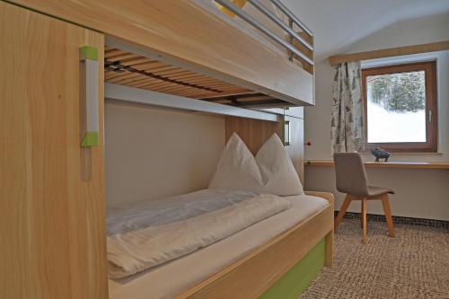 Ein Etagenbett oder Etagenbetten in einem Zimmer der Unterkunft Appartement Schörghofer
