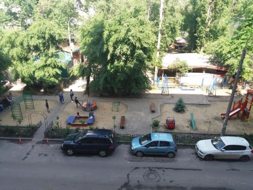 a group of cars parked in a park at Apartment on Plekhanovskaya street 22 in Voronezh