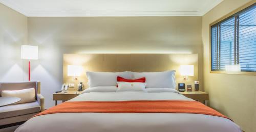 Säng eller sängar i ett rum på InterContinental São Paulo, an IHG Hotel