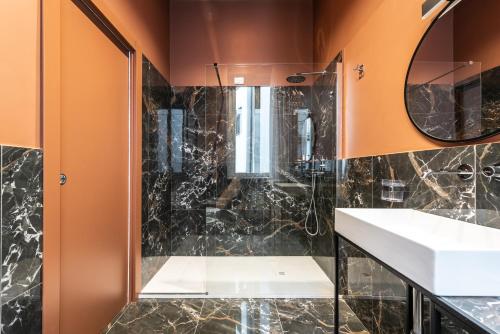 Koupelna v ubytování Voluta Suites