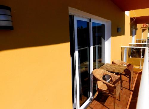 Ein Balkon oder eine Terrasse in der Unterkunft Chabela's Suites