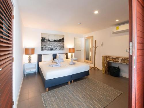 Voodi või voodid majutusasutuse Luxurious Villa in Jan Thiel with Pool toas