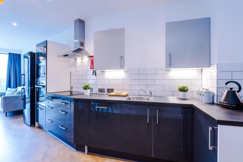 Dapur atau dapur kecil di Hilltop Serviced Apartments - Ancoats