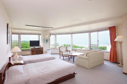 Cama ou camas em um quarto em Shiretoko Daiichi Hotel