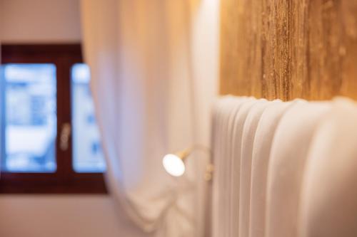 a close up of a curtain on a door at Residenza Marconi in Pinzolo