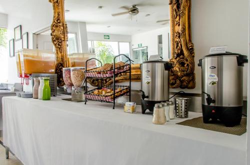 Příslušenství pro přípravu čaje a kávy v ubytování European Life Style Executive Suites