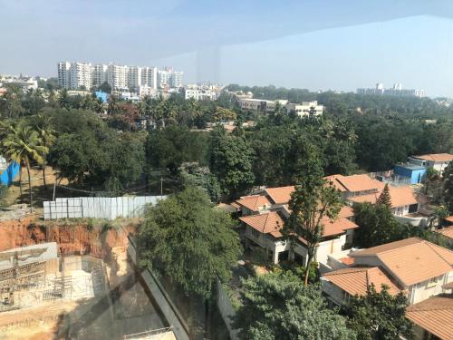 a view of a city with buildings and trees at Oakwood Residence Whitefield Bangalore in Bengaluru