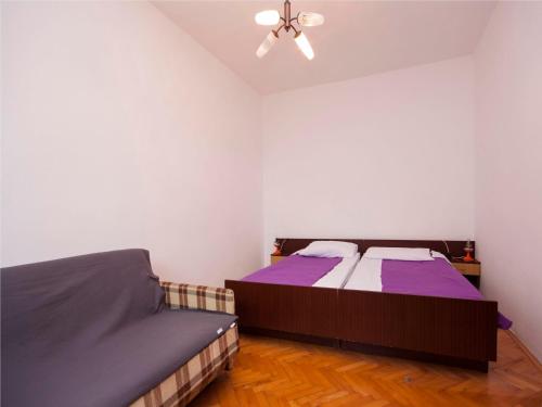 Ένα ή περισσότερα κρεβάτια σε δωμάτιο στο Apartment Bajan 545