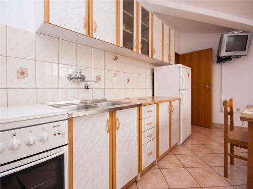 Η κουζίνα ή μικρή κουζίνα στο Apartment Bajan 545