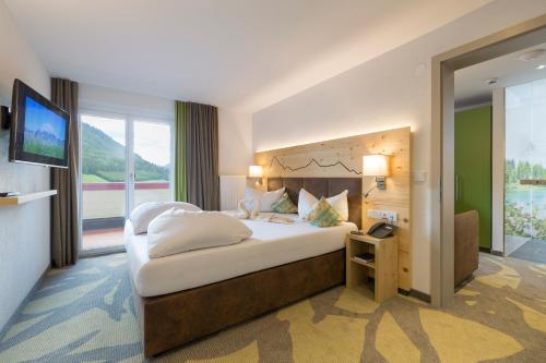 Posteľ alebo postele v izbe v ubytovaní Familotel Kaiserhof - Families only