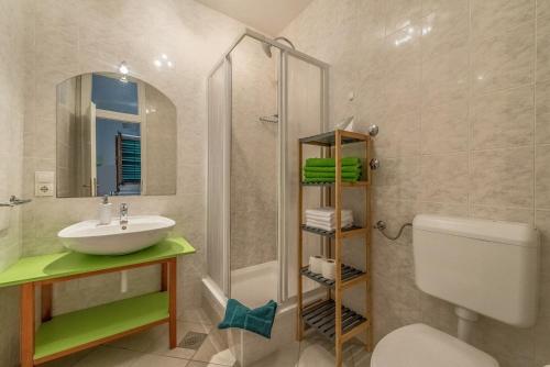 Kúpeľňa v ubytovaní Apartments Ivana-Mira