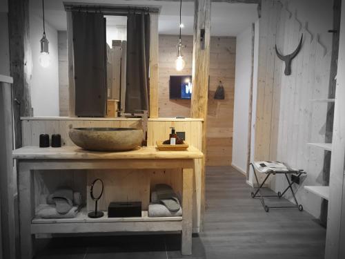 a bathroom with a sink and a mirror at WLodgeOne in Braunlage