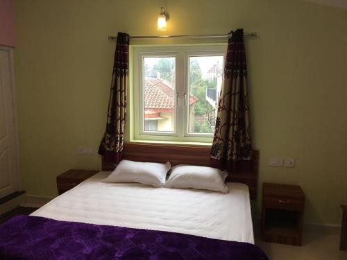 Postel nebo postele na pokoji v ubytování HAPPYSTAY rooms and cottages