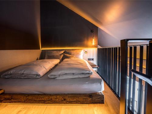 Ein Bett oder Betten in einem Zimmer der Unterkunft KRAFTalm