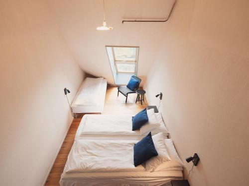 Кровать или кровати в номере Preikestolen BaseCamp