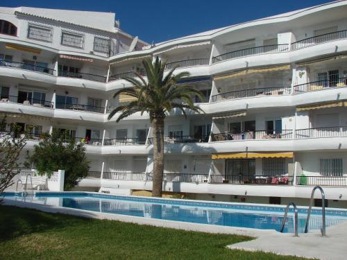 Bazén v ubytovaní ACAPULCO PLAYA 26 MENYBER alebo v jeho blízkosti