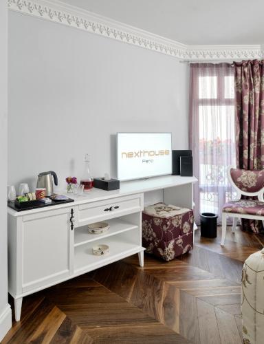TV a/nebo společenská místnost v ubytování Nexthouse Pera Hotel