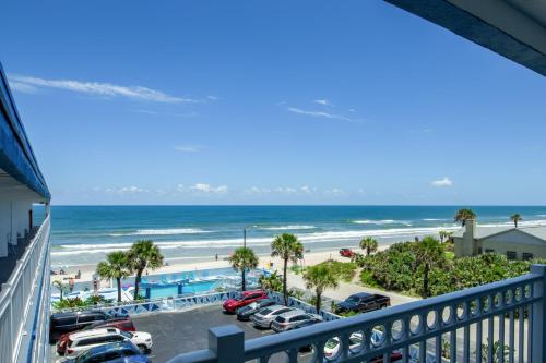 a view of the beach from the balcony of a condo at Chateau Mar Beach Hotel NEWLY REFURBISHED in Ormond Beach