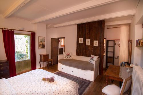 Postelja oz. postelje v sobi nastanitve La Colombiere du Château